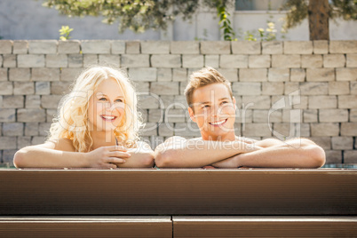 young couple at the pool