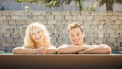 young couple at the pool