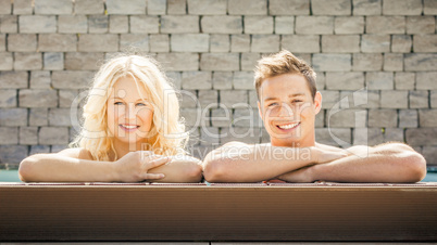 young couple at the pool