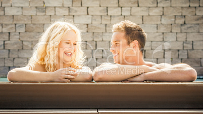 young couple at the pool