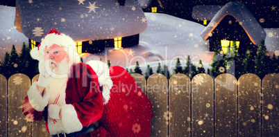 Composite image of santa asking for quiet with bag