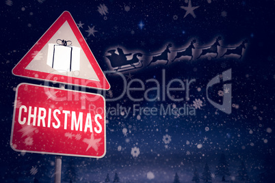 Composite image of christmas road sign