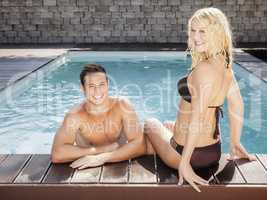 young couple at the pool