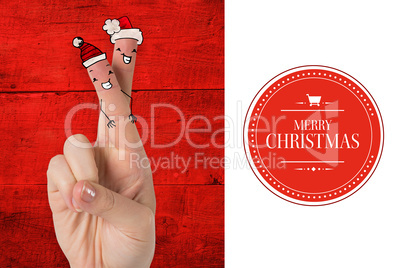 Composite image of christmas fingers