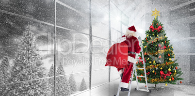 Composite image of santa steps up a ladder