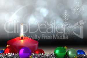Composite image of christmas baubles and tinsel