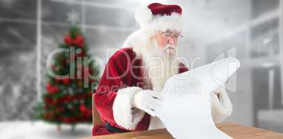 Composite image of santa reads a long list