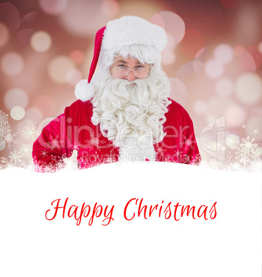 Composite image of happy santa claus holding a gift