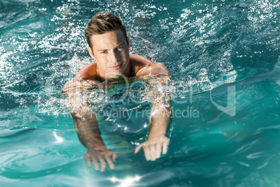 young man swimming