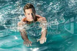 young man swimming