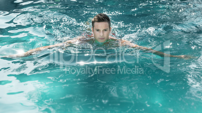 young man swimming