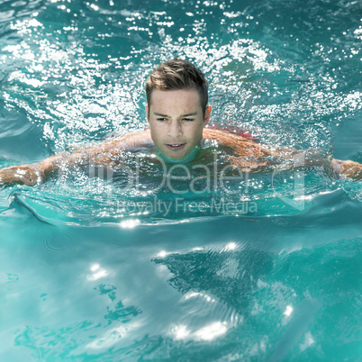 young man swimming