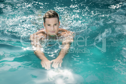 young man swimming