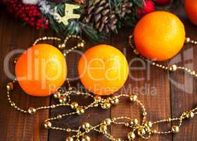 Oranges on the Wood Table with Christmas Background