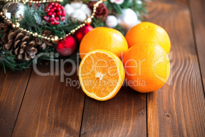 Oranges on the Wood Table with Christmas Background