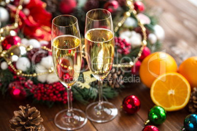 Two champagne glass on christmas background