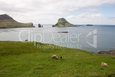 The islands Gasholmur and Tindholmur and  Mykines on the Faroe I