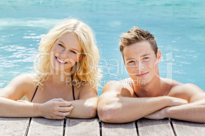 young couple at the pool