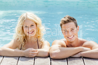 young couple at the pool