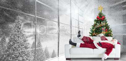 Composite image of santa claus taking a nap