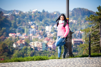 Young woman posing outdoor in autumn