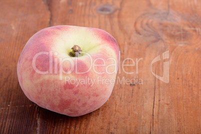 peach set on the wooden background