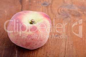 peach set on the wooden background