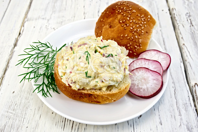 Appetizer of radish and cheese on bun in plate