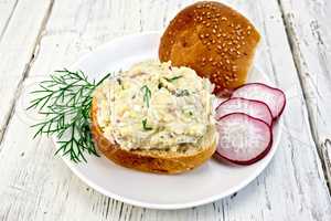 Appetizer of radish and cheese on bun in plate