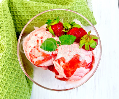 Ice cream strawberry with napkin on board top