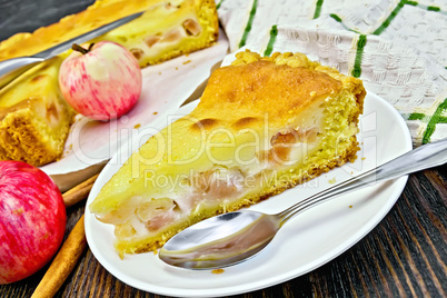 Pie apple with sour cream and cinnamon on board