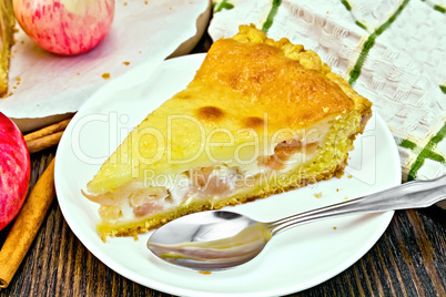 Pie apple with sour cream on dark board