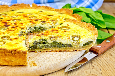 Pie with spinach on the board