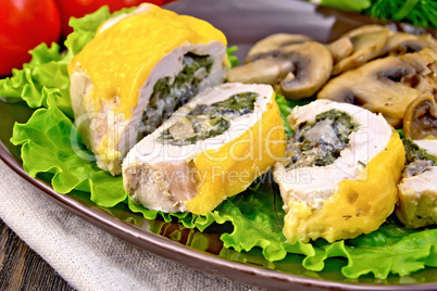 Roll chicken with champignons on board