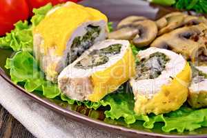 Roll chicken with champignons on board