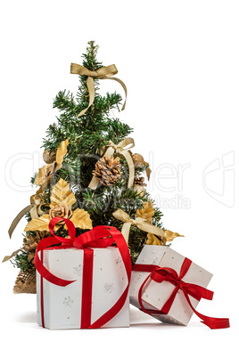 Decorated Christmas tree and gifts, isolated on white background