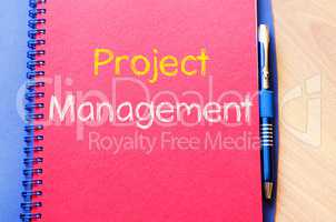 Project management write on notebook