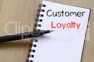 Customer loyalty write on notebook