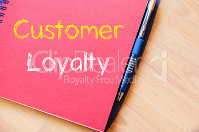 Customer loyalty write on notebook