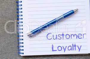 Customer loyalty write on notebook