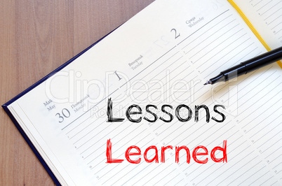 Lessons learned write on notebook
