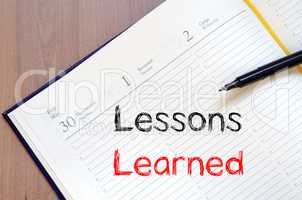 Lessons learned write on notebook