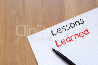 Lessons learned write on notebook