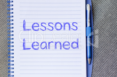 Lessons learned write on notebook