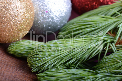 Decorated christmas tree - holiday background, green tree eve branch close up with christmas balls