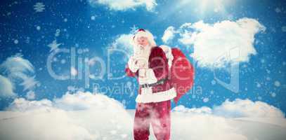 Composite image of santa keeping a secret