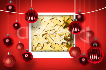 Composite image of many gold star decorations background