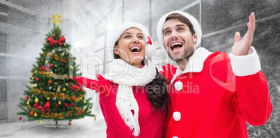 Composite image of festive young couple