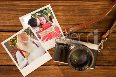 Composite image of mother and daughter at home at christmas