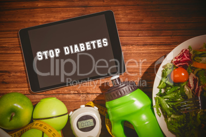 Stop diabetes against tablet on healthy persons table